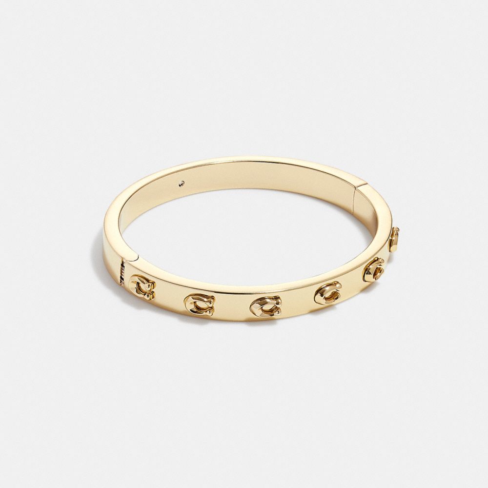 COACH®,PEGGED SIGNATURE HINGED BANGLE,enamel,,Front View