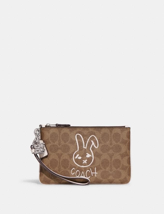 Coach Small Wristlet in Colorblock Signature Canvas With Rabbit Lh/Tan Chalk Translations 23.1.1. RTL Translations  
