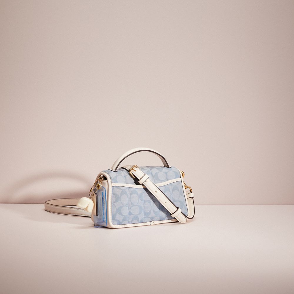 COACH®,UPCRAFTED TURNLOCK CLUTCH 20 IN SIGNATURE CHAMBRAY WITH QUILTING,Signature chambray,Small,,Angle View