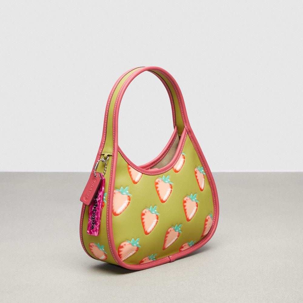 COACH®,Ergo Bag In Coachtopia Leather With Strawberry Print,,Angle View