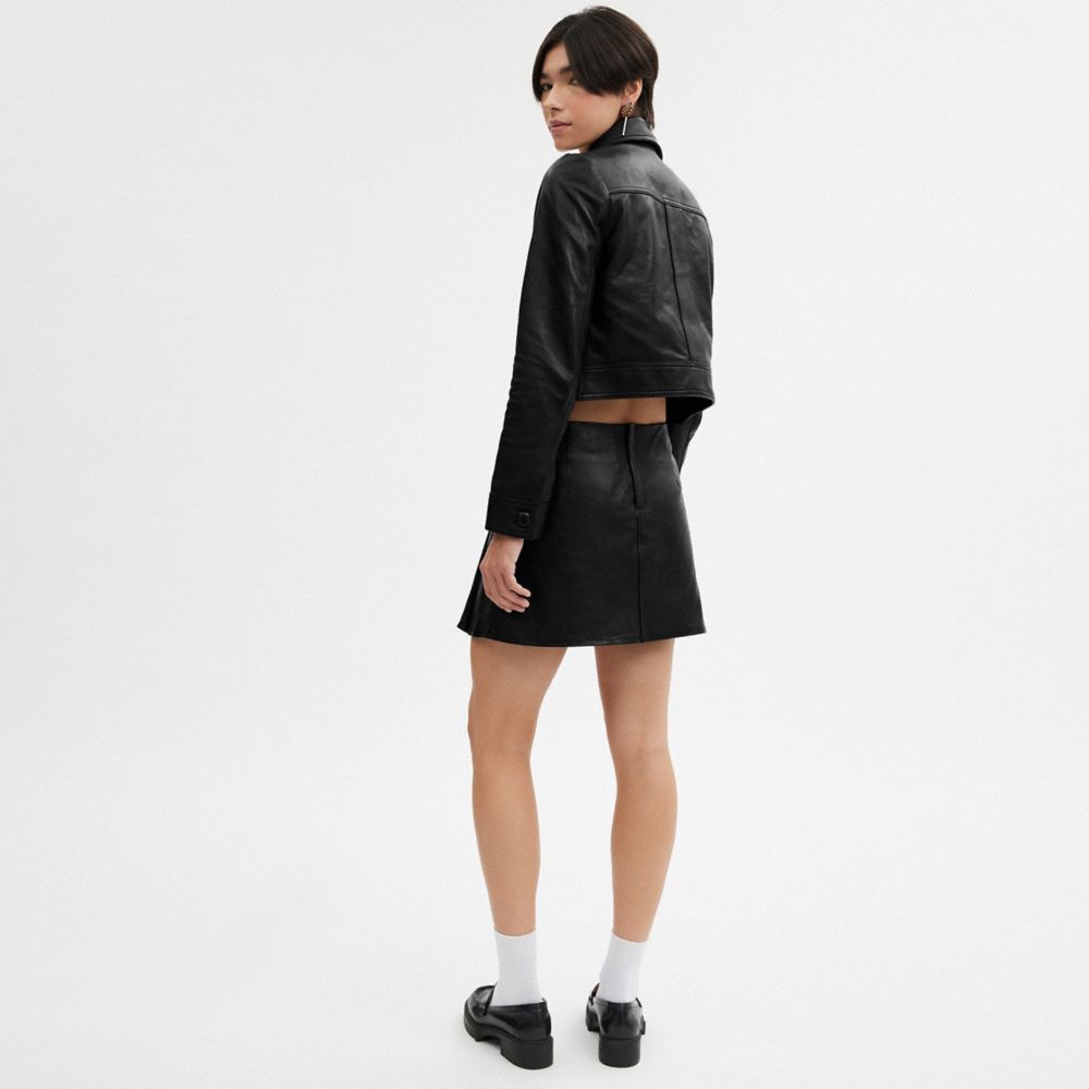 COACH®,Heritage C Leather Mini Skirt,Leather,Polyester,Pleated,A-Line,Logo,Metal,Pleats,Cocktail,Black,Scale View