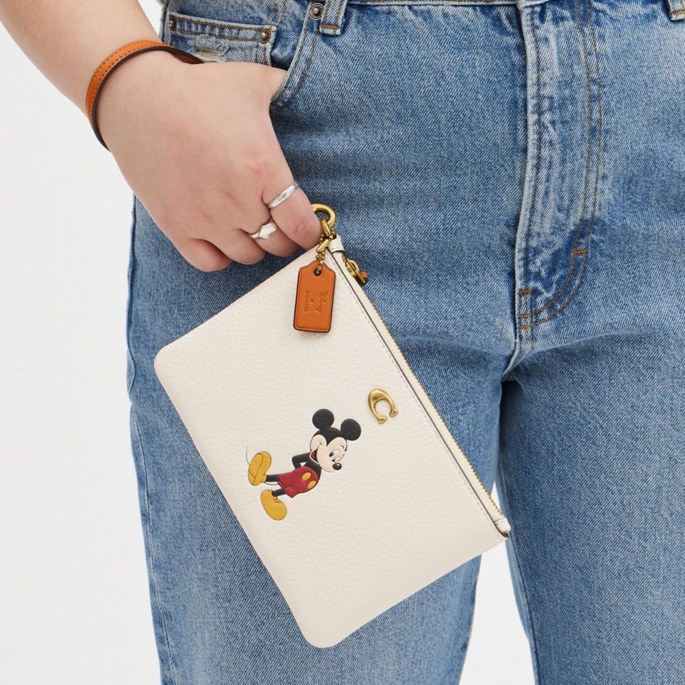COACH®,Disney X Coach Essential Small Wristlet In Regenerative Leather With Mickey Mouse,,Detail View