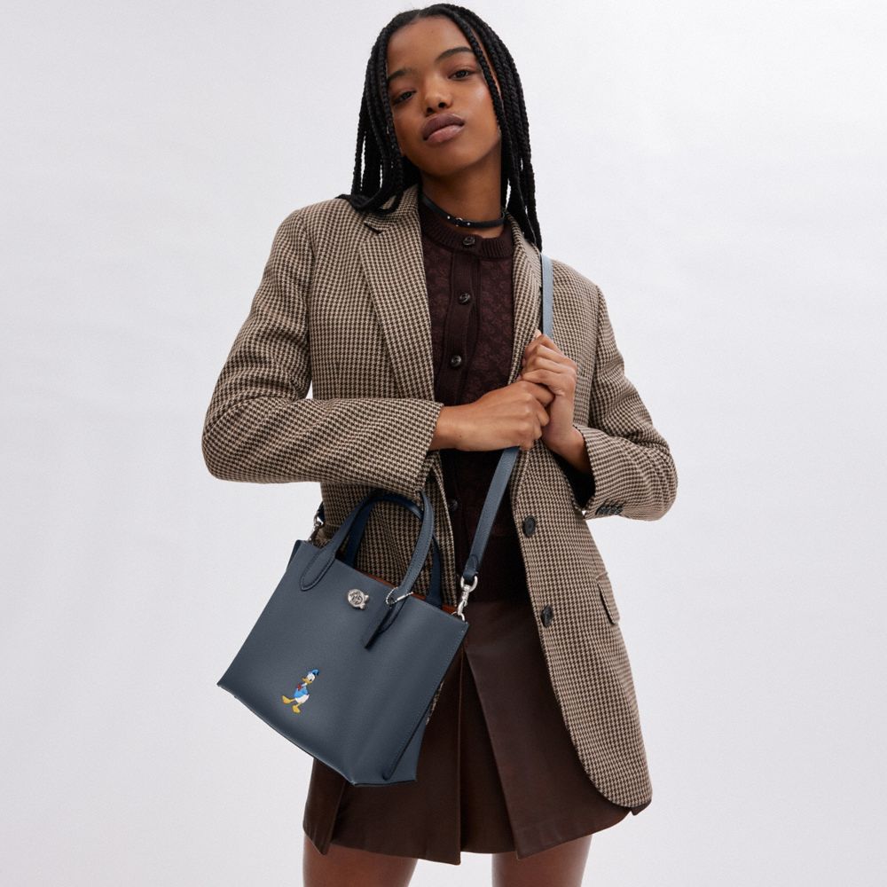 COACH®,Disney X Coach Willow Tote Bag 24 With Donald Duck,Leather,Crossbody,Graphic,Embossed,Logo,Color Metal,Casual,Work,Navy,Detail View