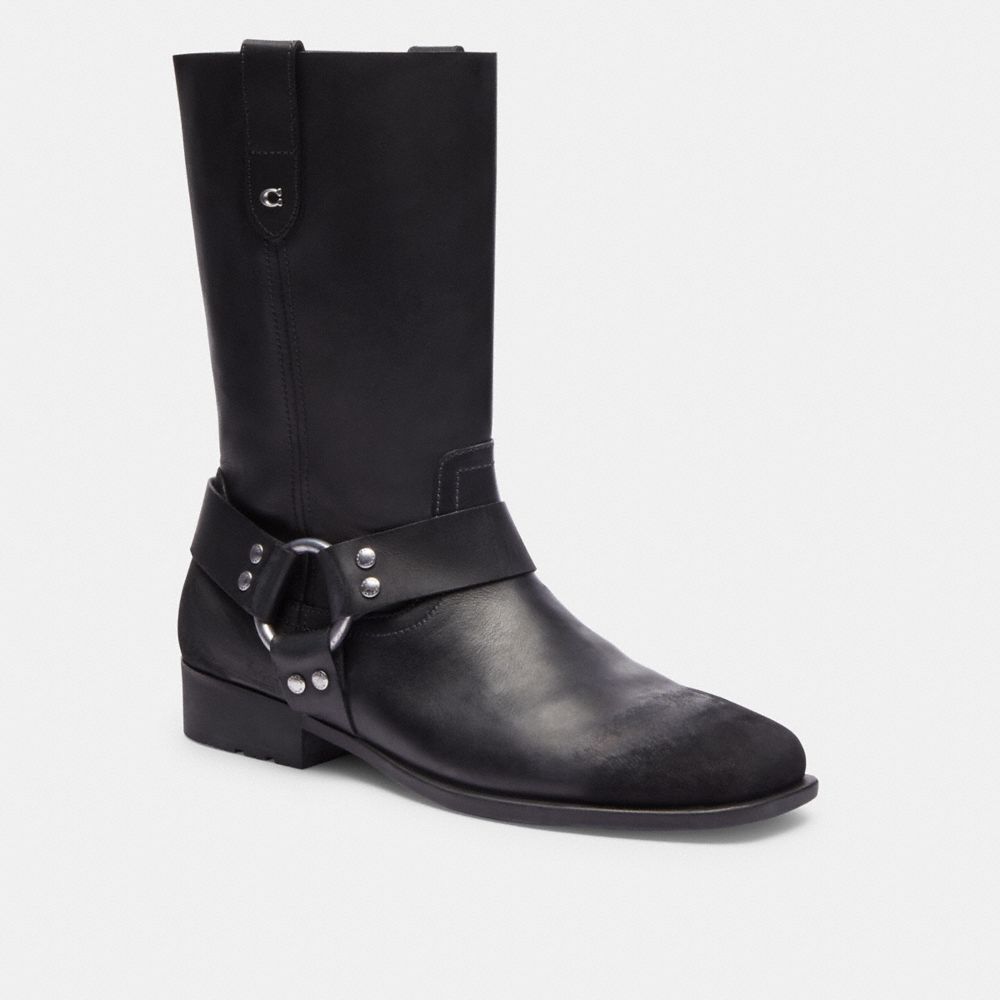 COACH®,Tara Biker Boot,Rubber,Leather,Moto,Logo,Metal,Harness Embellishment,Studded,Pull Tab,Silver Metal,Outdoor,Casual,Black,Front View