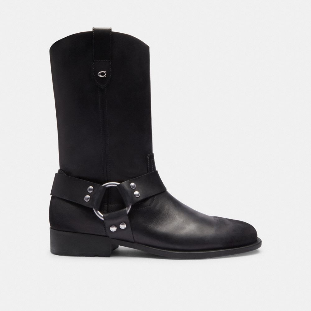 COACH®,Tara Biker Boot,Rubber,Leather,Moto,Logo,Metal,Harness Embellishment,Studded,Pull Tab,Silver Metal,Outdoor,Casual,Black,Angle View