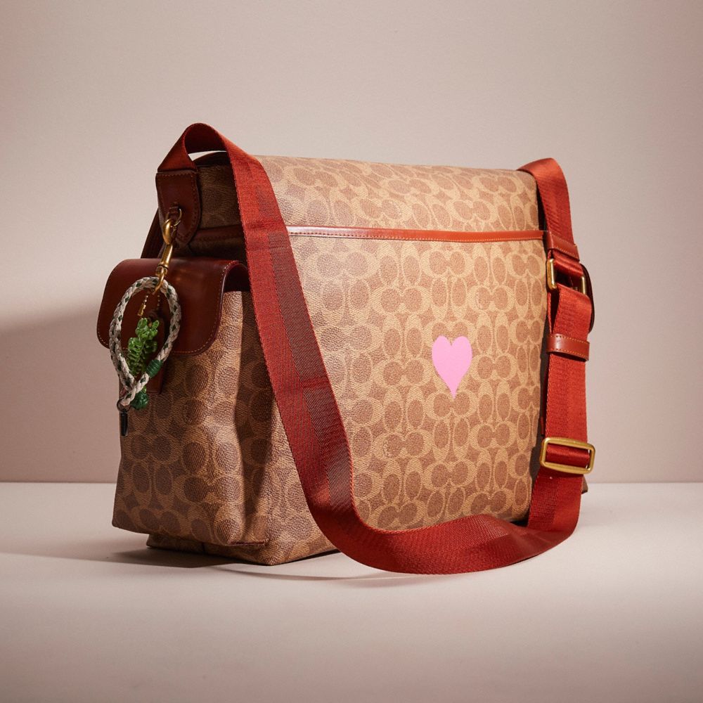 COACH®,UPCRAFTED MESSENGER BAG IN SIGNATURE CANVAS,Hello Summer,,Angle View
