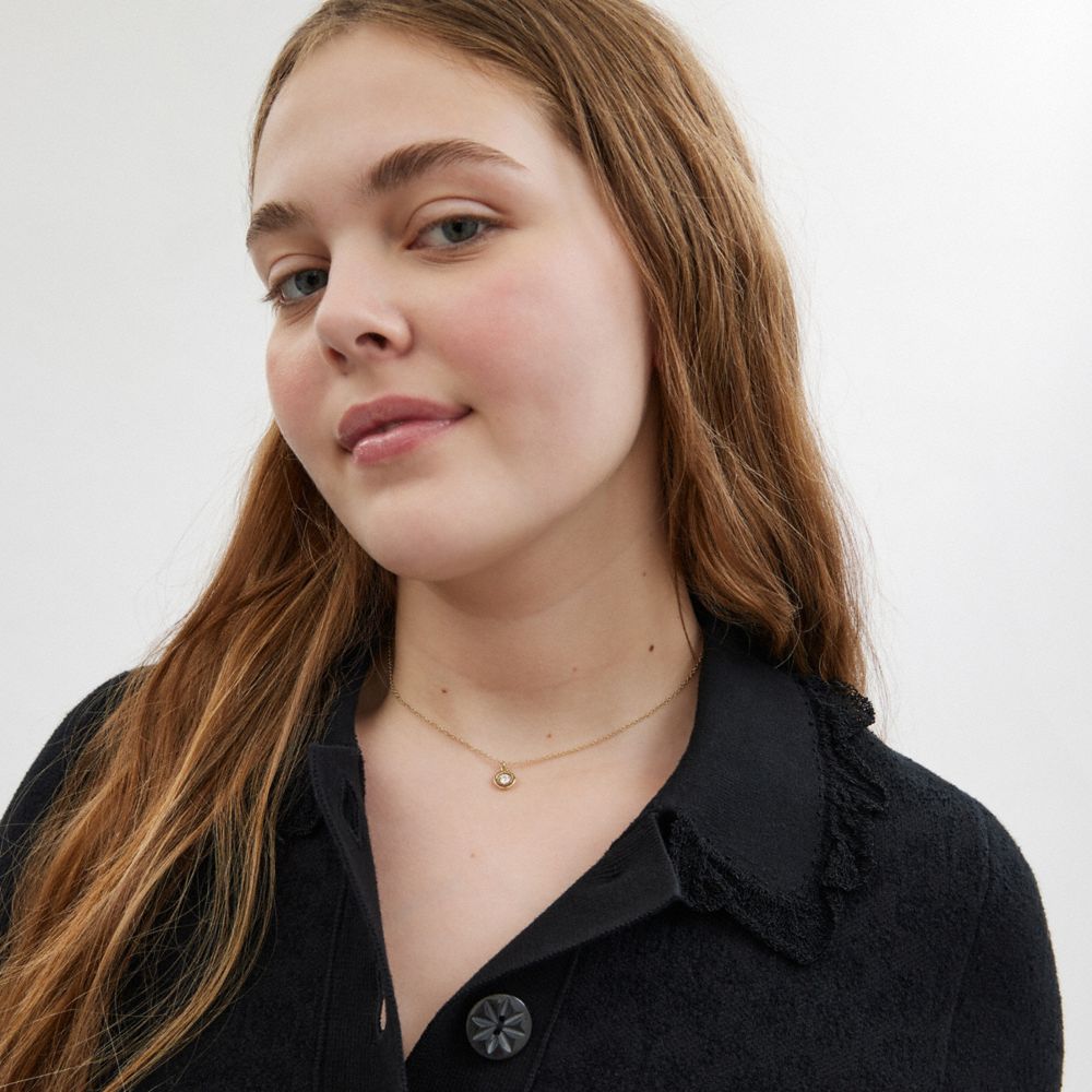 COACH®,Halo Round Pendant Necklace,Single Strand,Glass,Crystal,Cubic Zirconia,Gem Embellishment,Brass,Work,Casual,Clear,Detail View