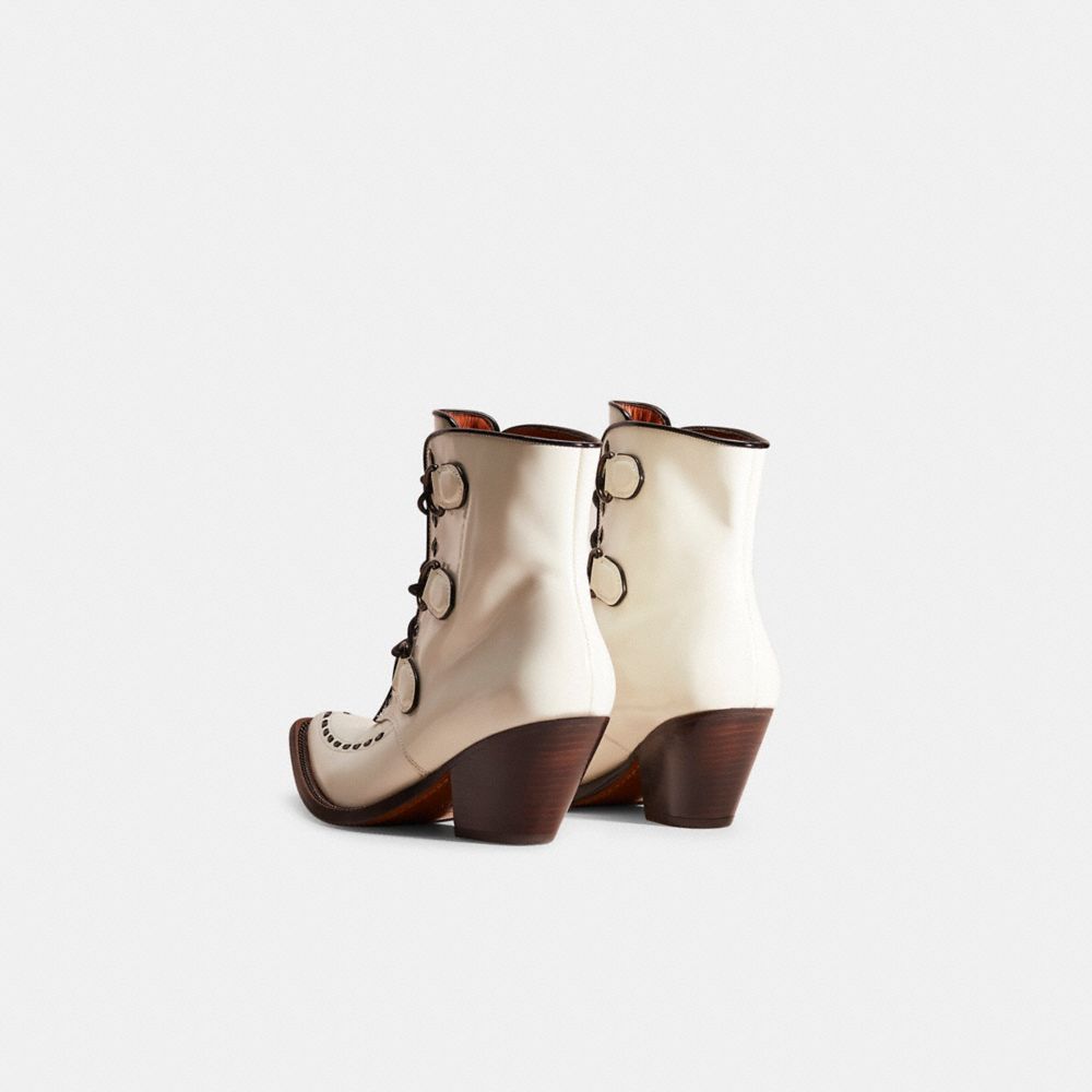 COACH®,Restored Lace Up Chain Bootie,Leather,Bootie,Lace Up,Piping,Pull Tab,Day Party,White,Back View