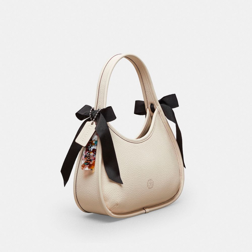 COACH®,Ergo Bag In Coachtopia Leather With Bows,Leather,Polyester,Shoulder Bag,Plastic,Logo,Bow,Casual,Cream,Angle View