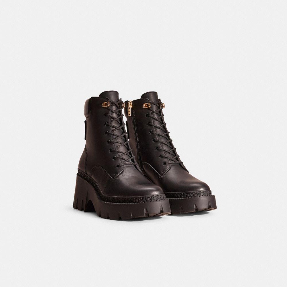 COACH®,Restored Ainsely Bootie,Rubber,Combat,Foam,Embossed,Logo,Metal,Traction,Pull Tab,Day Party,Black,Angle View
