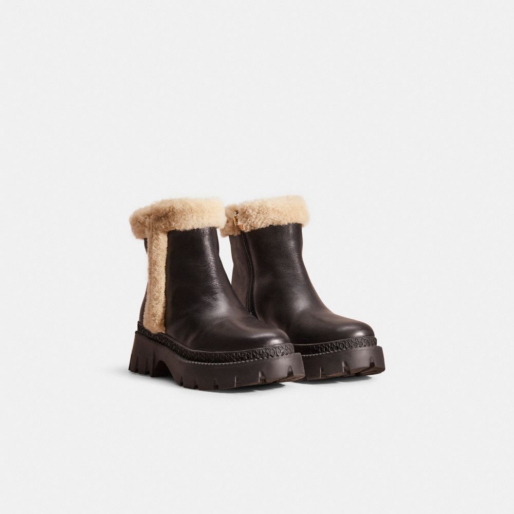 COACH®,Restored Jane Bootie,Leather,Rubber,Winter,Foam,Fur Embellishment,Color Block,Traction,Outdoor,Black,Angle View