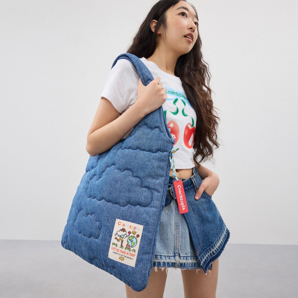 COACH®,Flat Tote With Cloud Quilting,Cotton,Lining Cotton,Tote,Plastic,Tag Embellishment,Casual,Blue,Detail View