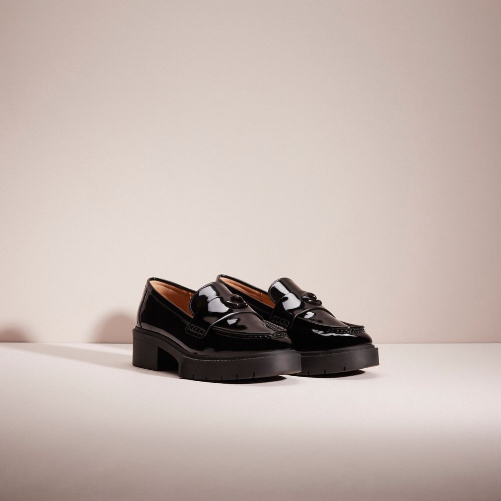 COACH®,Restored Leah Loafer,Leather,Memory Foam,Lining Leather,Rubber,Loafer,Logo,Metal,Penny Loafer,Side Vents,Casual,Black,Angle View