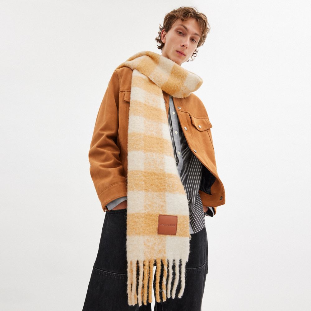 COACH®,Oversized Plaid Muffler With Leather Patch,Alpaca,Rectangle,Applique,Fringe,Logo,Casual,Multi Color,Angle View