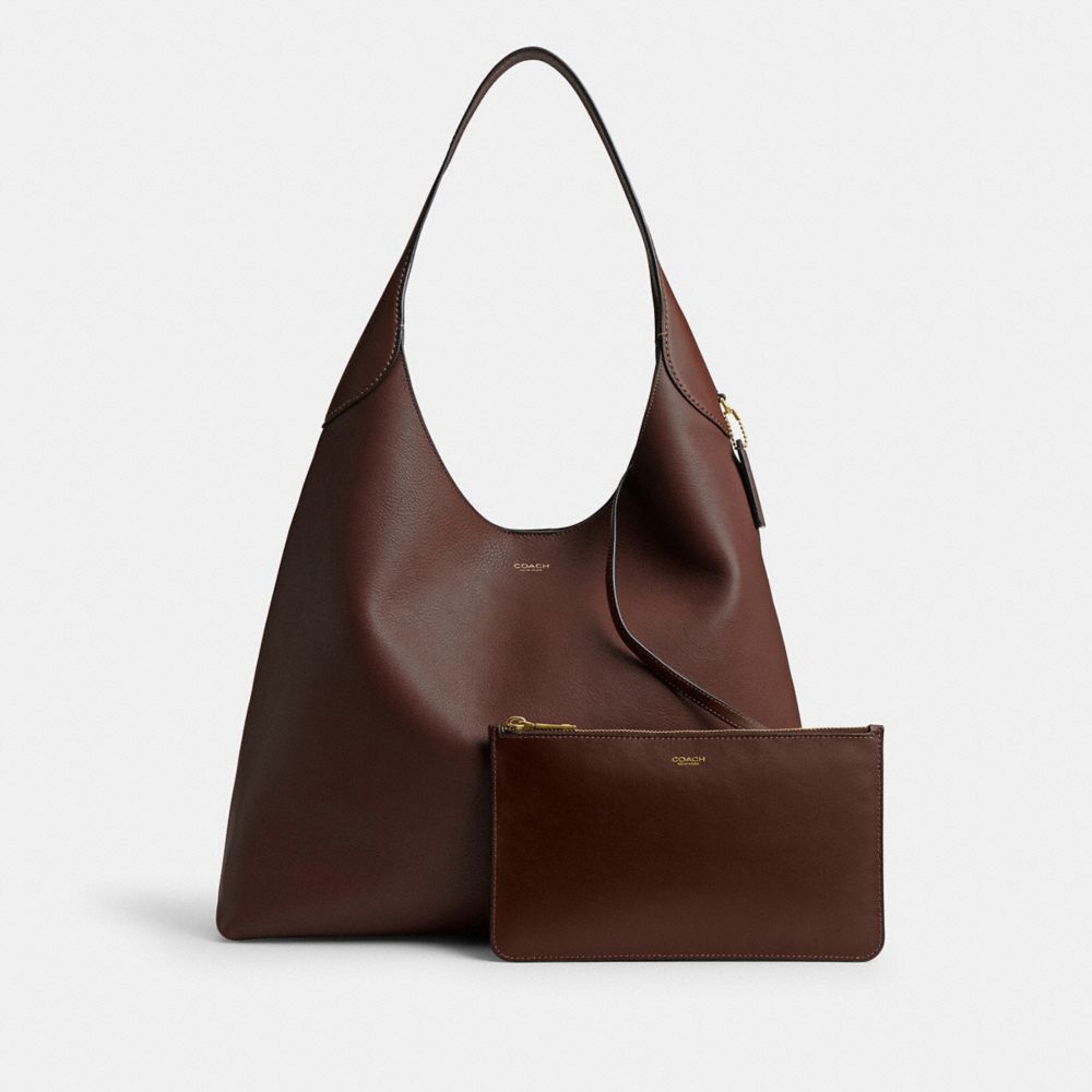 COACH®,New York Zip Pouch,Leather,Wristlet,Pouch,Logo,Casual,Brown,Angle View