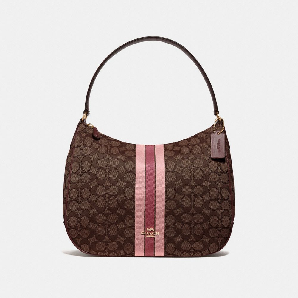 zip shoulder bag in signature jacquard