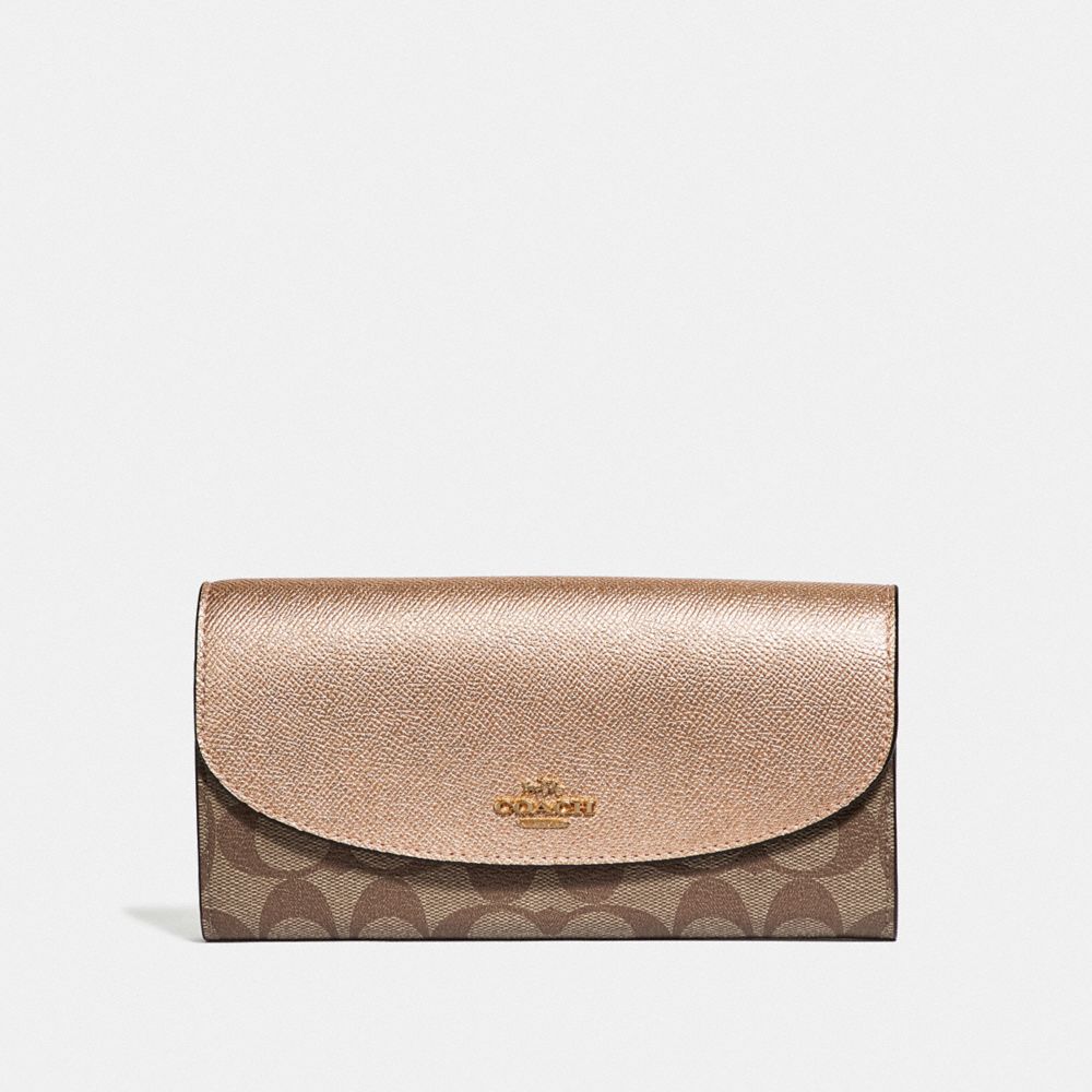 coach purse rose gold