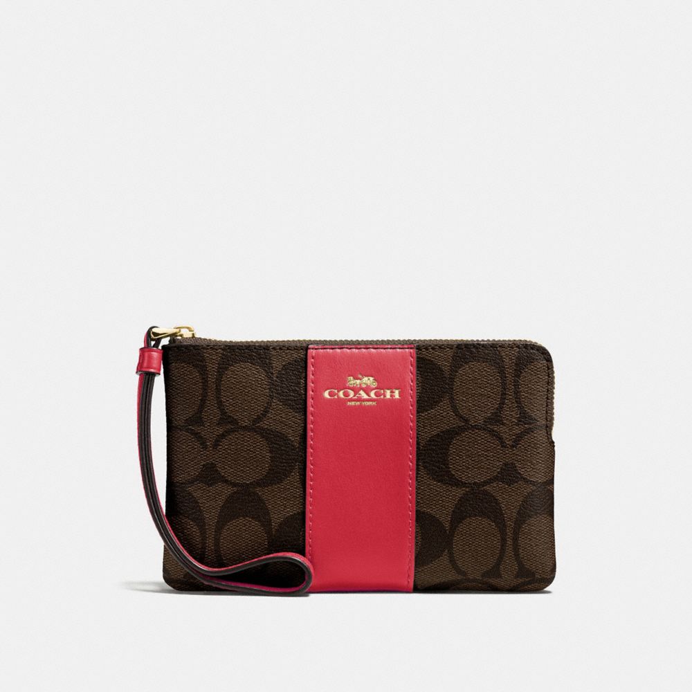 Coach CORNER ZIP WRISTLET IN SIGNATURE CANVAS