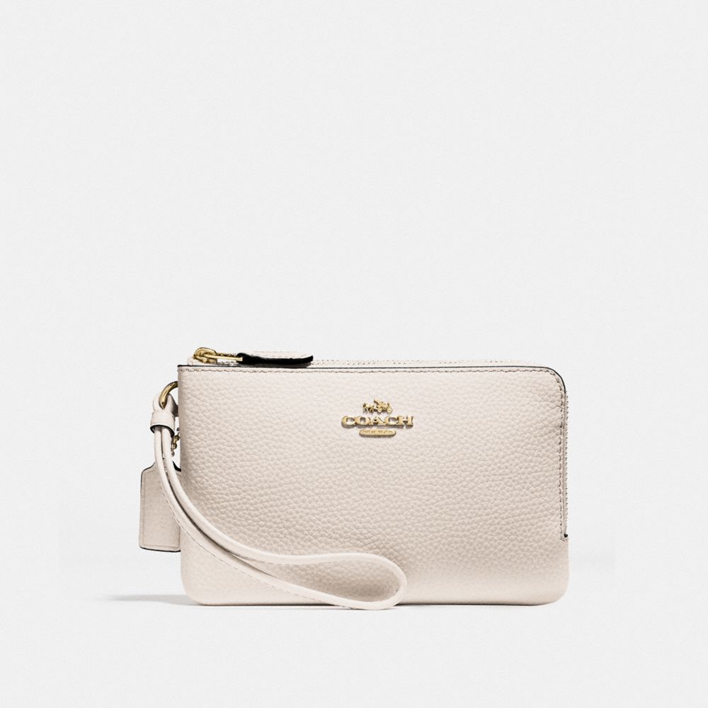 coach wristlet white