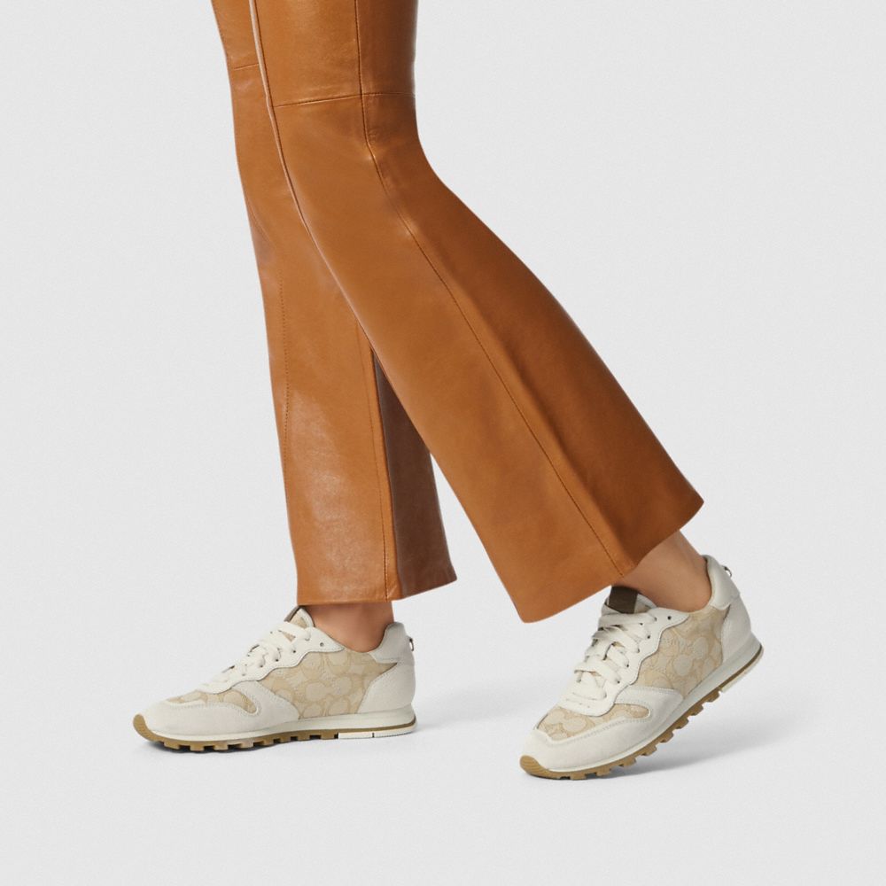 coach c125 runner black