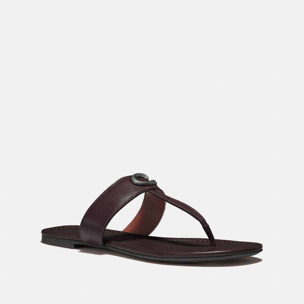 coach gold flip flops