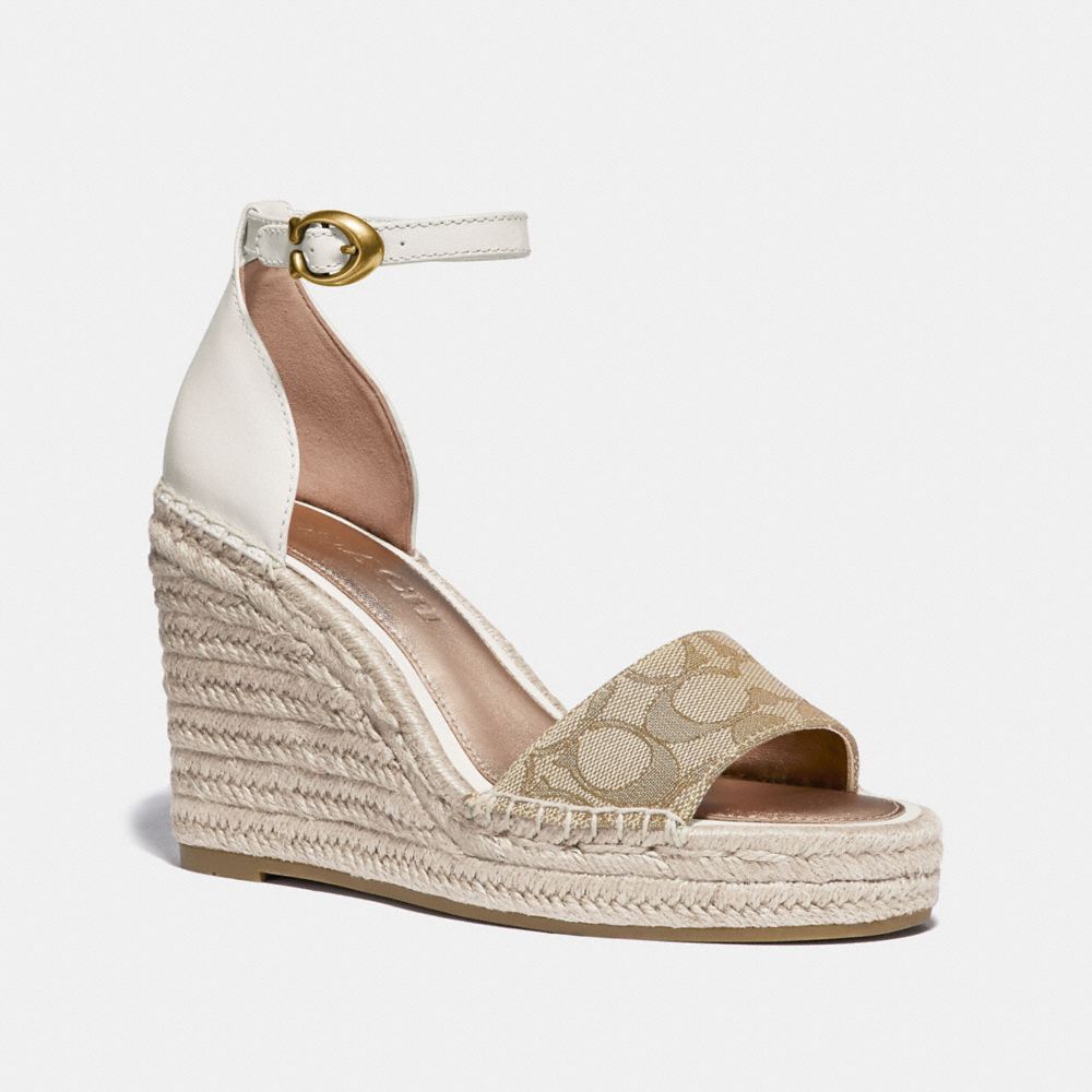 coach wedge pump