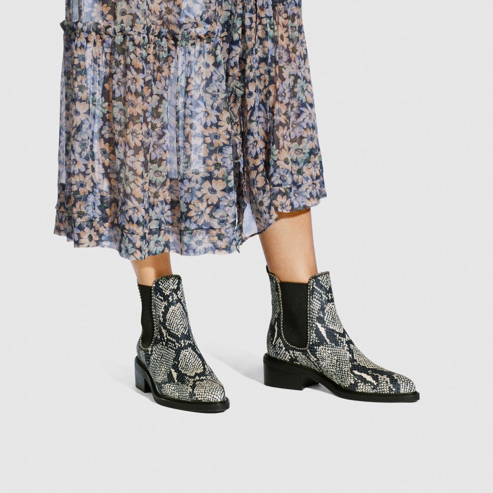 coach snakeskin boots