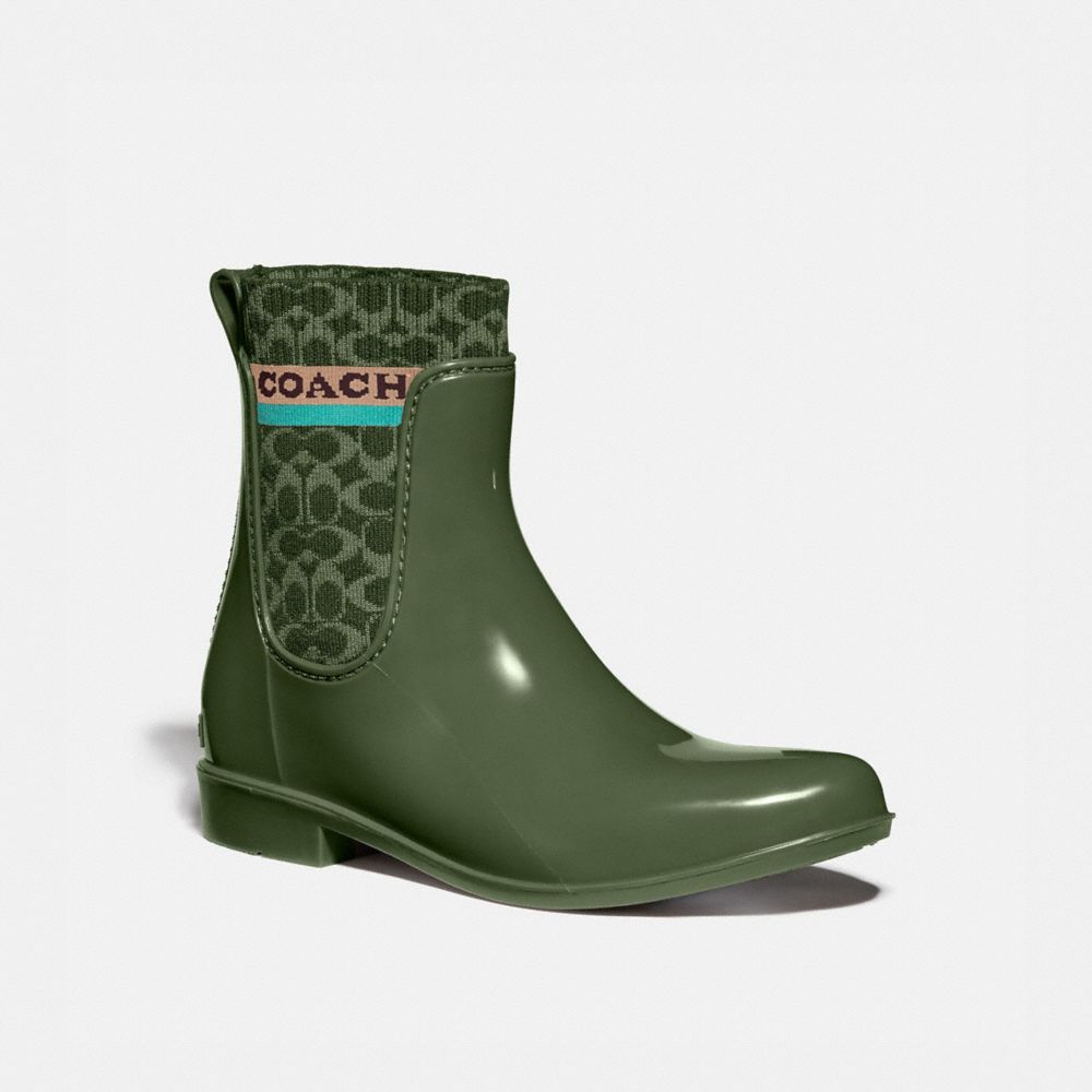 coach leopard rain boots