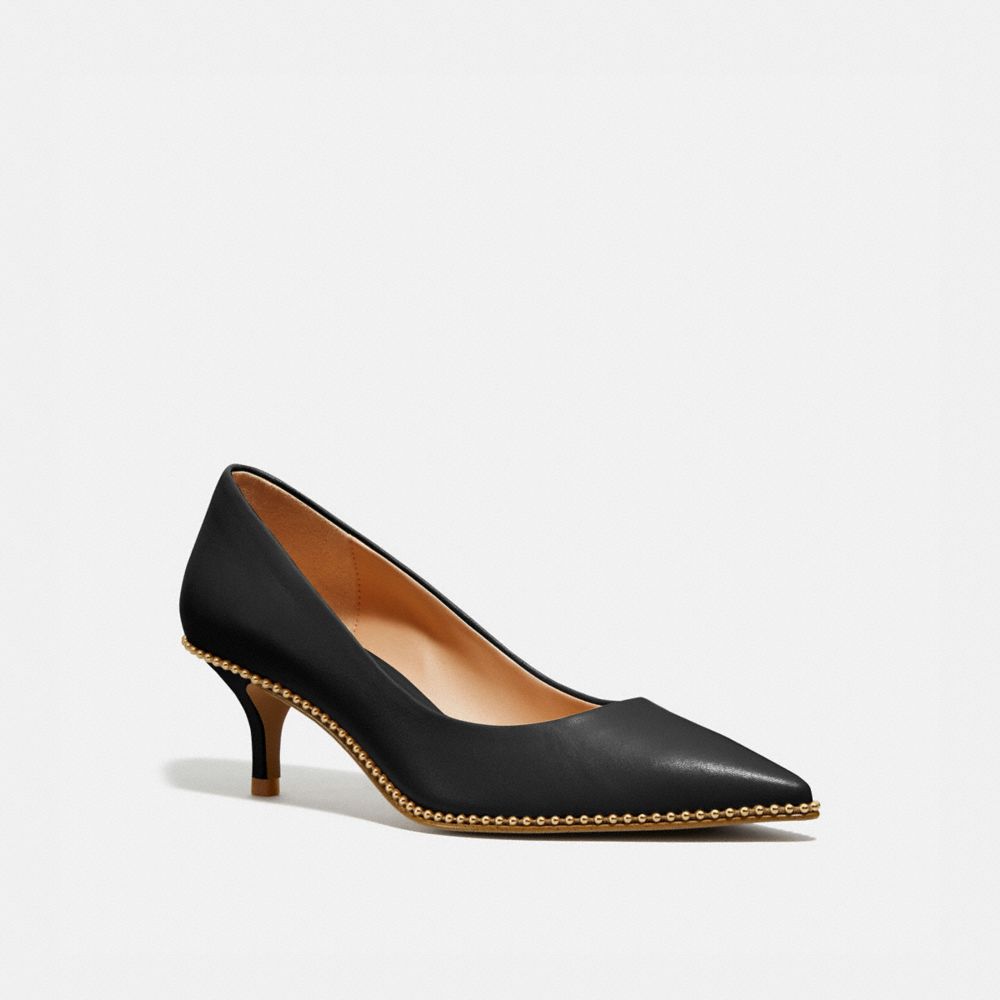 coach signature pumps