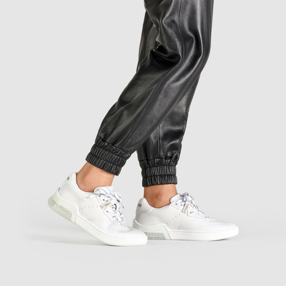 all white coach sneakers