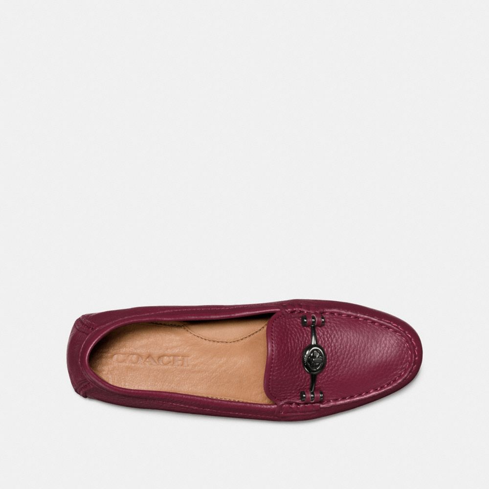 coach moccasin flats