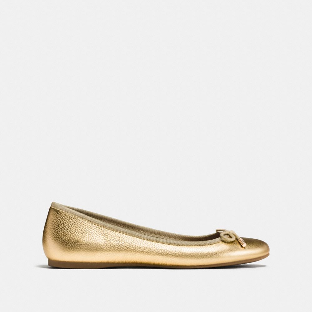 coach gold ballet flats